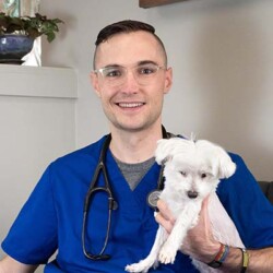 Dr. Greg Thompson and one of his dogs